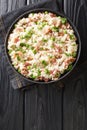 Venetian food Risi e Bisi of rice with peas and ham slices close-up in a plate. horizontal top view Royalty Free Stock Photo