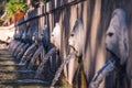 Venetian fountain with lions heads in Spili. Royalty Free Stock Photo