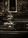 Venetian gondola detail against ancient house at waterway Royalty Free Stock Photo