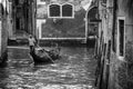 Venetian gondolier in Venice Italy. Black and white image Royalty Free Stock Photo