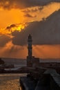 Venetian harbor and lighthouse in Chania on Crete at sunset Royalty Free Stock Photo