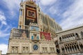 The Venetian hotel and resort with digital billboards, blue sky and clouds in Las Vegas Nevada