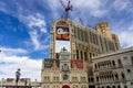 The Venetian hotel and resort with digital billboards, blue sky and clouds in Las Vegas Nevada