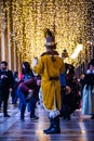 Venetian masks of a man and photographers and bokeh effect.