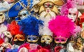 Colourful collection of Venetian masquerade ball masks on display