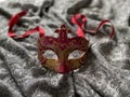 Venetian masquerade and carnival mask in red and gold