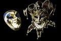 Venetian souvenir masks on black background isolated