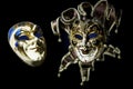 Venetian souvenir masks on black background isolated Royalty Free Stock Photo