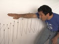 Venezuelan artist Elias Crespin with kinetic art work at his studio in Caracas Venezuela