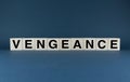 Vengeance. Cubes form the word Vengeance. Vengeance word concept Royalty Free Stock Photo