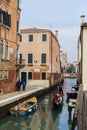 A narrow channel full of gondolas in Venice Royalty Free Stock Photo