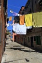 VENICE - APRIL 10, 2017: The view on alley in Venice. Laundry dr Royalty Free Stock Photo