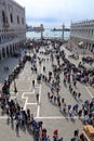 VENICE - APRIL 9, 2017: The view on San Marco Square with tourists near the Doge Palace, on April 9, 2017 in Venice, Italy Royalty Free Stock Photo