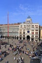 VENICE - APRIL 9, 2017: The view on San Marco Square with tourists near the Zodiac Clock Tower, on April 9, 2017 in Venice, Italy Royalty Free Stock Photo