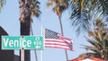 Venice beach street road sign, California city, USA. Tourist resort, palm trees Royalty Free Stock Photo