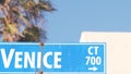 Venice beach street road sign, California city, USA. Tourist resort, palm trees Royalty Free Stock Photo