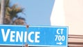 Venice beach street road sign, California city, USA. Tourist resort, palm trees Royalty Free Stock Photo