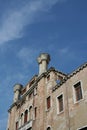 Venice, brick building facade and chimney pots