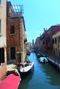 Venice canal, boats and residents