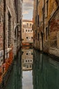 Venice canal with the reflection of the sky Royalty Free Stock Photo