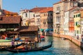 Venice canals with gondolas