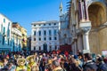 Venice Masquerade crowds of tourists at San Marco square Italy