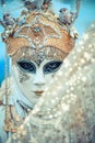 Venice Carnival mask model in San Marco Square Royalty Free Stock Photo