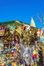 Venice carnival masks and gifts at kiosk displayed for sale on vendor stand