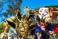 Venice carnival masks and gifts at kiosk displayed for sale on vendor stand