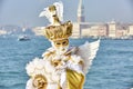 Venice carnival 2017. Venetian Carnival Costume. Venetian Carnival Mask. Venice, Italy. Venetian gold carnival costume. Royalty Free Stock Photo