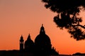 Venice cathedral dome silhouette at sunset. Amazing burning sky