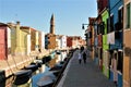 Venice city, canal, water, colours, romantic and ancient houses, boats and tourists in Italy