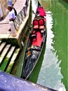 Venice city, gondola, gondolier and touristic attraction in Italy