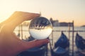 Venice gondola view through crystal glass ball