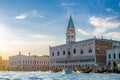 Venice cityscape with gondolas and yacht boats on water of San Marco basin