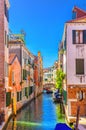 Venice cityscape with narrow water canal