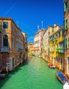 Venice cityscape with narrow water canal