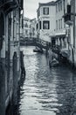 Venice cityscape, narrow water canal and traditional buildings.