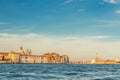 Venice cityscape with water of Giudecca canal of Venetian lagoon, embankment of Fondamenta Zattere Royalty Free Stock Photo