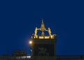 Venice, Clock and bell tower in Renaissance style in San Marco square with the statues called Mori di Venezia, UNESCO world