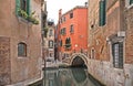 Venice colorful corner with old buildings, small water canal, little bridge and boats Royalty Free Stock Photo