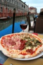 Venice: delicious pizza with a glass of wine