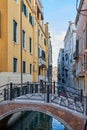 Venice, empty bridge and canal in a summer day in Italy