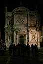 Venice, facade of a church, at night