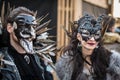 Venice - February 6, 2016: Colourful carnival mask through the streets of Venice