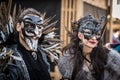 Venice - February 6, 2016: Colourful carnival mask through the streets of Venice