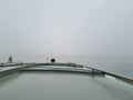 venice in fog from a boat