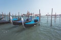 Venice, gondolas docked near the shore, Italy Royalty Free Stock Photo