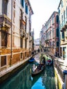 Venice gondolier driving gondola Royalty Free Stock Photo