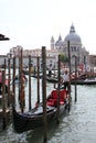 Venice Gondolier in a traditional venetian canal